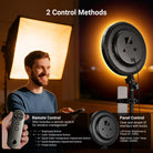 A man is using the remote to control the NEEWER BR45B ring light.