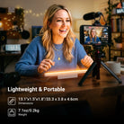 A content creator is live-streaming, using the NEEWER TL106B LED Chin Fill Light to create warm, even illumination on her face, while her smartphone on a tripod streams the session to viewers.